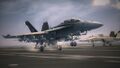 A Super Hornet landing on an aircraft carrier