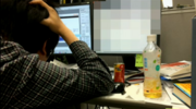 A developer with his screen blurred out